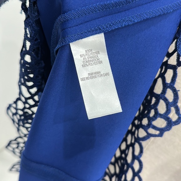 Classic style combines with modern, edge trend for a dress that is flattering. - Picture 7 of 8